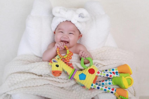 信阳宝宝为什么会吐奶